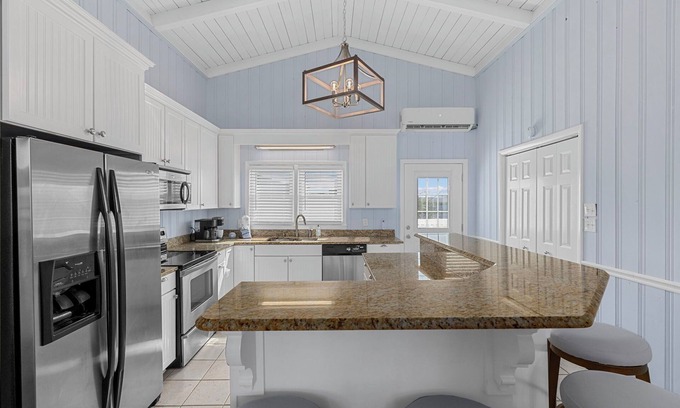 North Myrtle Beach House | Channel Vibes - 5BR Waterfront House w/Hot Tub and Fire Pit