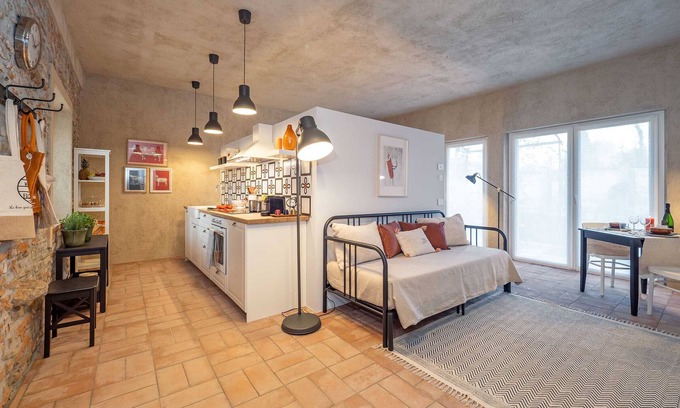 Cressa Apartment | Characteristic Apartment with Garden in Restored Farmhouse