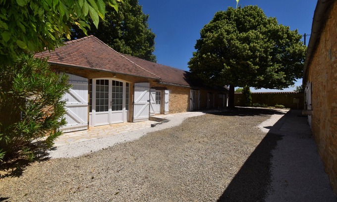 Saint-Laurent-la-Vallee Cottage | Charming stone house with shared, heated swimming pool and landscaped park