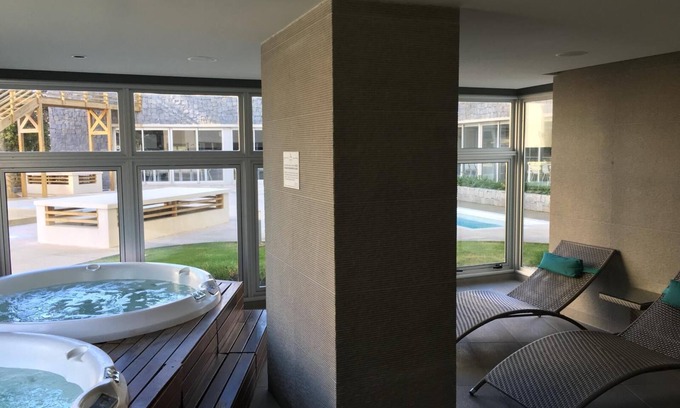 Aidy Grill Apartment | Charming 2-bedroom apartment in luxury coastal building