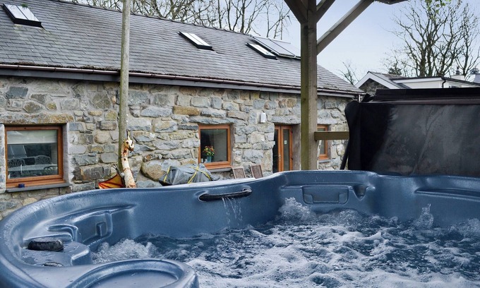 Criccieth Cottage | Charming barn conversion with hot tub and walks from the door.