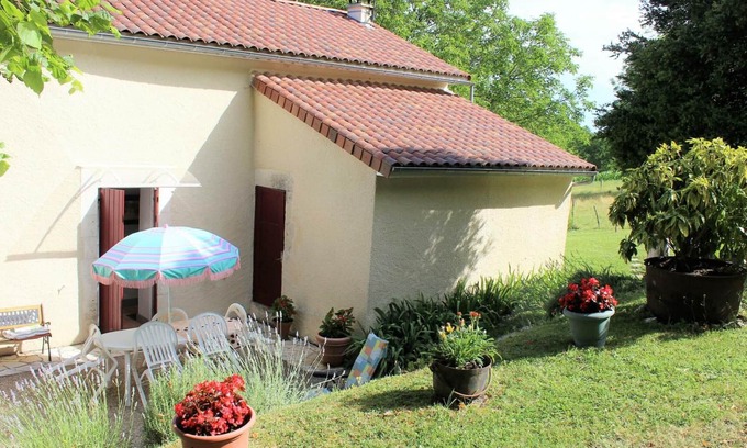 Mensignac Cottage | Charming Country Cottage with Farm Animals, Fireplace, and Garden in Dordogne