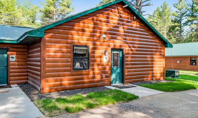 Conover House | Charming dog-friendly cabin with hot tub, fireplace, patio, grill, & central AC