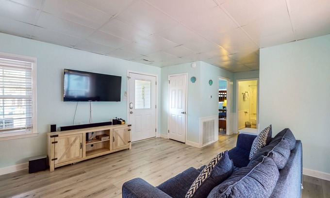 Cherry Grove Beach House | Charming house with hot tub, W/D, dog friendly & close to beach