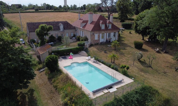 Neuvy Cottage | Charming House with Shared Pool, Views of Moulins, and Private Terrace