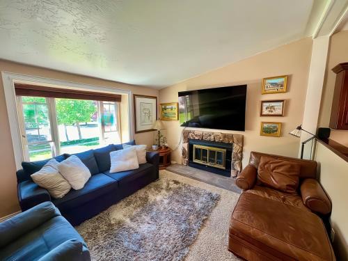 Millcreek House | Charming Mountain Retreat with Enclosed Backyard and Artistic Flair