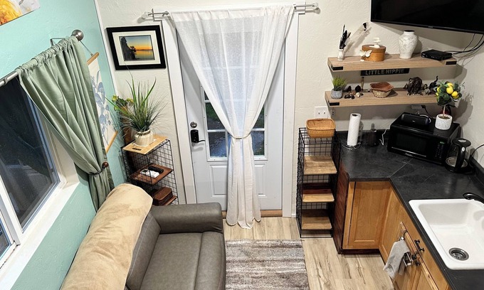 Lowell Cottage | Charming tiny house in lovely Lowell with AC, WiFi, fenced in private space