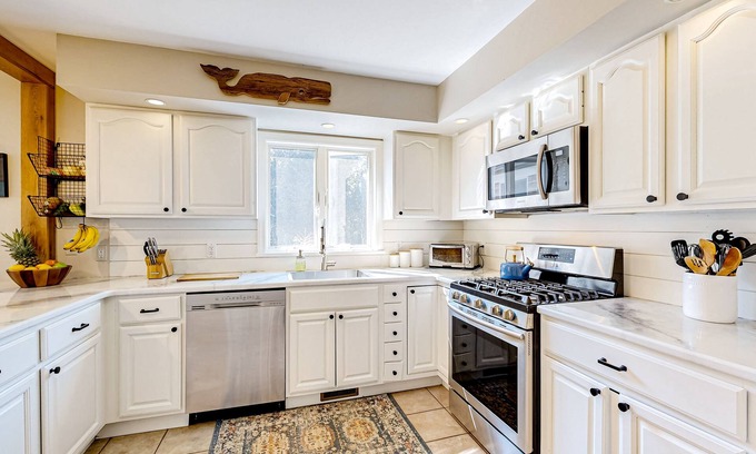 West Tisbury House | Charming tree-lined home with outdoor games, firepit, grill, W/D, & AC