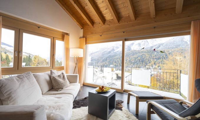 Engadin Scoul Apartment | Chasa Capricornin: modern and spacious attic apartment right next to the Motta Naluns mountain railroad