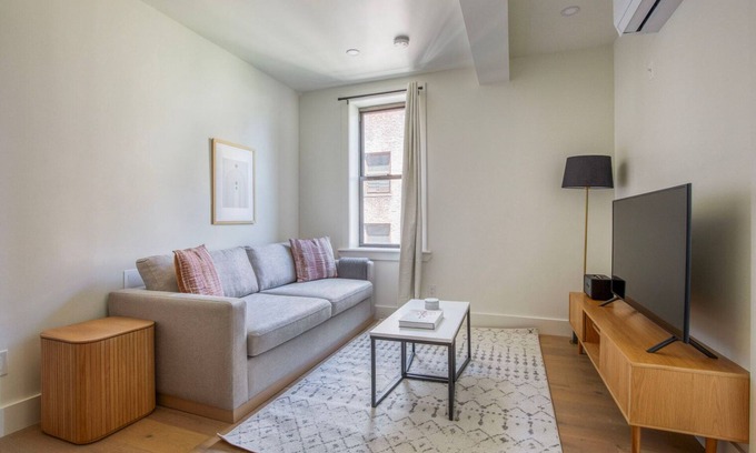 East Village Apartment | Clean East Village 1BR w/Rooftop Pool, Gym, W/D, A/C, by Blueground