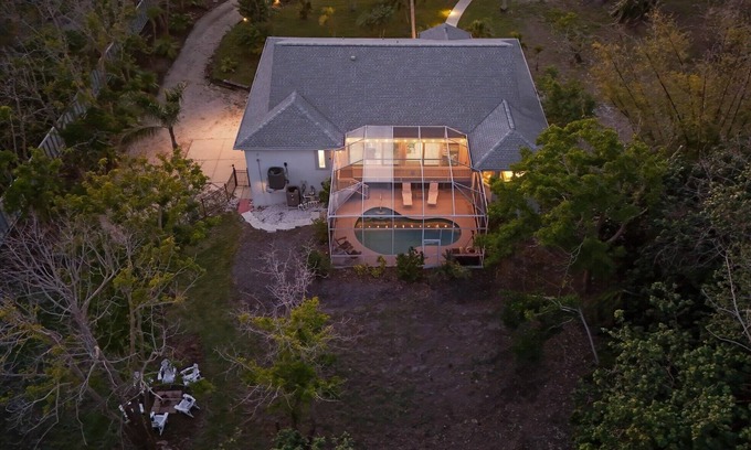 Palma Sola House | Coastal Soul - Heated pool, 5BR/4.5BA, 1-acre, AMI & Robinson Preserve