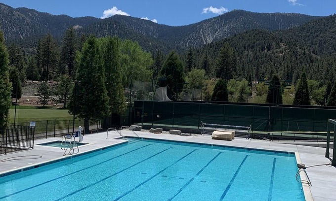 Pine Mountain Club Cabin | Cool off in the beautiful pool. We have AC and Starlink and a cozy wood stove.