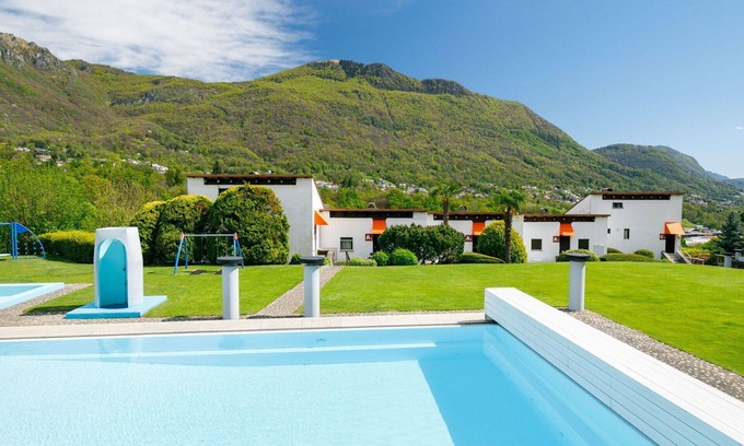 Capriasca Apartment | Cosy apartment for 4 people with pool, WIFI, TV, patio, pets allowed, panoramic view and parking