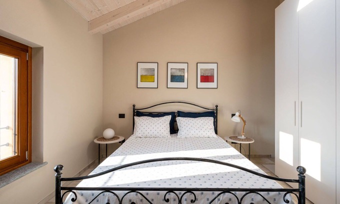 Rocca D'Arazzo Apartment | Cosy apartment for 4 guests with A/C, WIFI, TV, terrace and parking