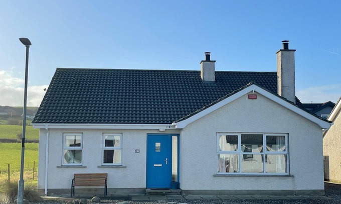 Bushmills House | Cosy coastal bungalow in Portballintrae. Five minute drive to portrush.