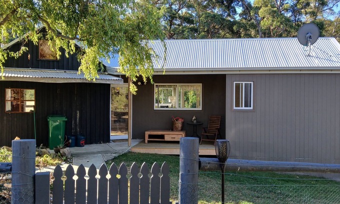 Middleton Ski Chalet | cosy cottage with wood heater, surrounded by bushland