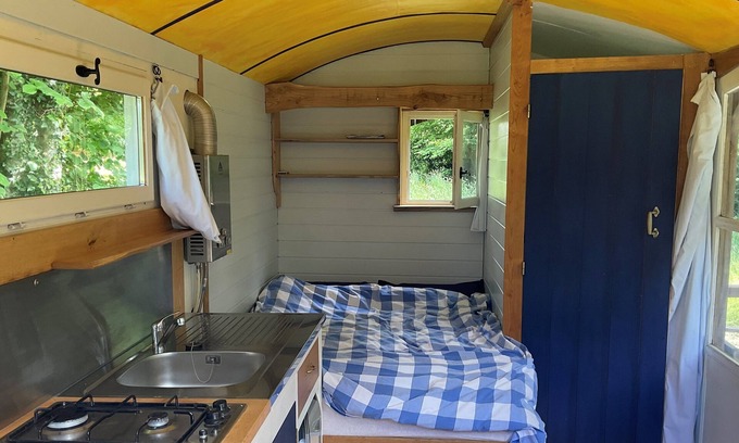 Saint-Vaury House | Cosy shepherds hut for two, with balcony, set alone in a hectare of land.