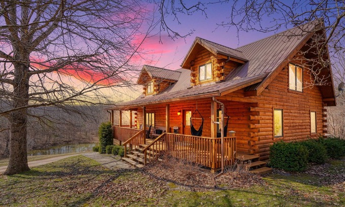 Creola Cabin | Cozy 2-bedroom cabin. Private and wooded setting, WiFi, Pond & Hot Tub