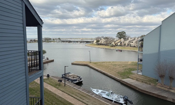 Walden on Lake Conroe Condo | Cozy 2-bedroom condo on the water, with community pool and fitness center.