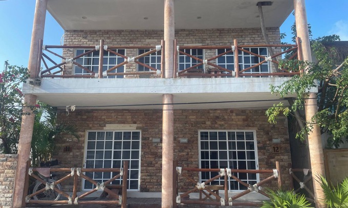 Downtown Holbox Apartment | Cozy apartment in charming Holbox with AC, WiFi cuarto en planta baja