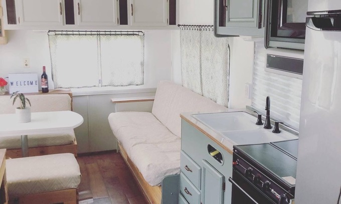 Kewadin RV Rental | Cozy campground with 1 bedroom and WiFi, AC near beautiful Elk Rapids