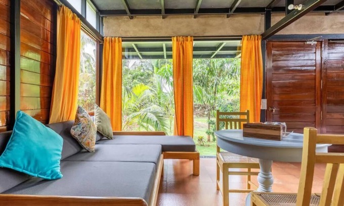 Morjim House | Cozy cottage in lush green 2 min Morjim beach