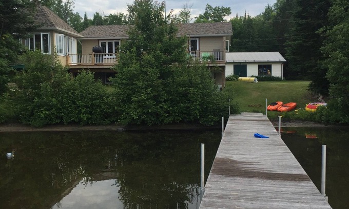 Cayamant Ski Chalet | Cozy cottage on a beautiful shallow sand beach at Patterson lake!