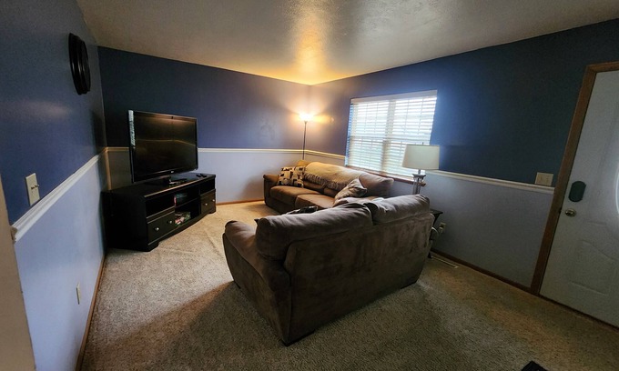 Elkhart House | Cozy & Quiet Home with Memory Foam and Pet Friendly with Fenced Yard
