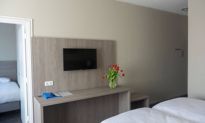 Ooij Hotel | Cozy Riverside Retreat with Outdoor Terrace, and Easy City Access