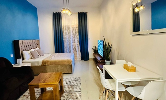 Al Hamra Village Apartment | Cozy studio with WiFi and fitness room with stunning lagoon view