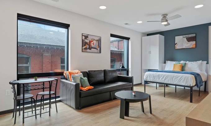Lockerbie Square Apartment | CozySuites Mass with parking, lounge and roof deck 18