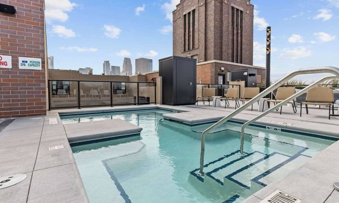 Warehouse District Apartment | CozySuites NLG with pool, bowling alley, sauna 27