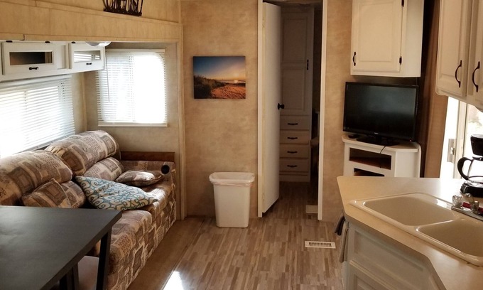 Benzonia House | Crystal Camper - Large Two Bedroom Spacious RV w/Wooded Trail