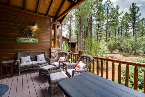 Torreon House | Deck and Fire Pit Show Low Villa in the Pines
