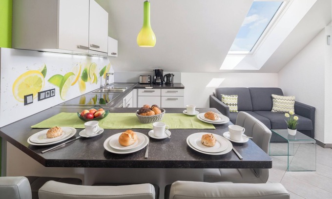 Bensheim Condo | Design apartment for 1-5 people with 2 bedrooms & roof terrace. Near bathing lake