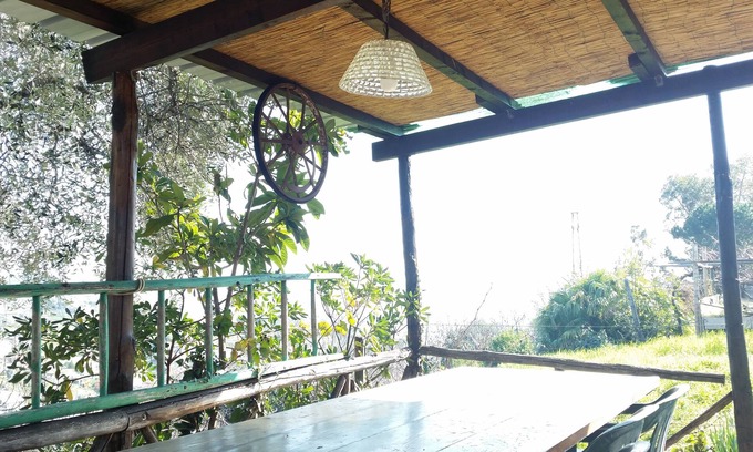 Sanremo House | Detached cottage surrounded by greenery-independent cottage into the garden.