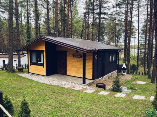 gmina Grodziczno House | Domek obity dechami