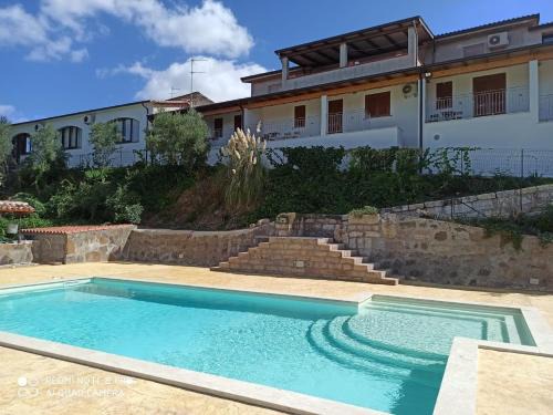 Pozzomaggiore House | Domus La Roccia