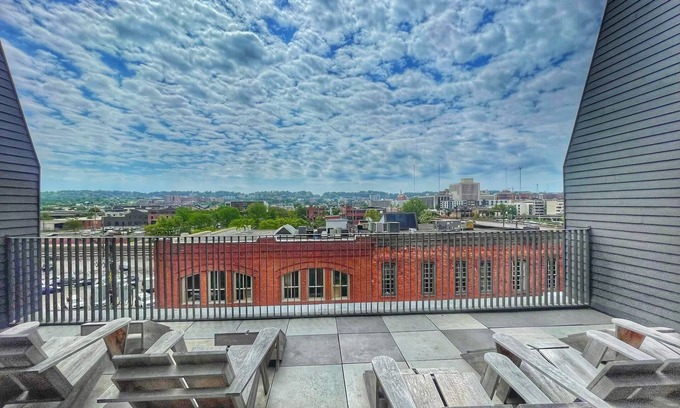 Central City Condo | Downtown Luxe Industrial Loft in Mercantile on Morris! Free parking! Dogs ok.