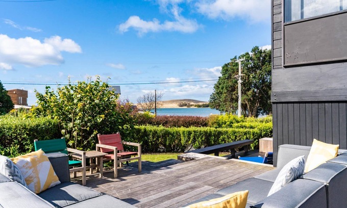 Mangawhai Heads House | Dune Views - Sunny, quirky kiwi bach with estuary views