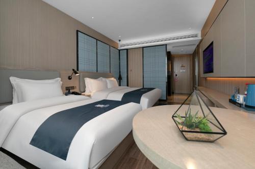 Shashi Hotel | Eharm Hotel Jingzhou Olympic Sports Center
