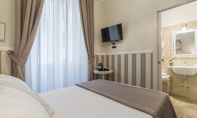 Rione XIV Borgo Apartment | Elegant Apartment in the Heart of Prati with Comfortable Rooms
