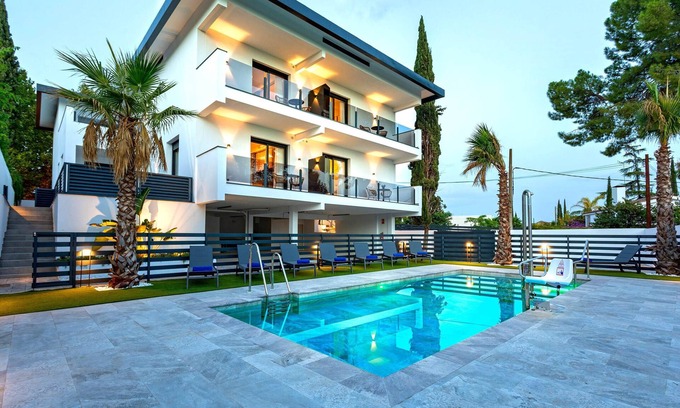 Distrito Norte Sierra Apartment | Elegant apartment with terrace & pool.Arruzafa V