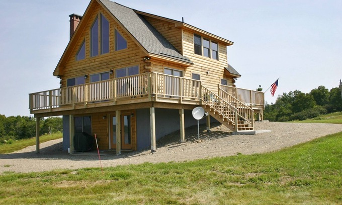Cutler House | Elegant log home with unobstructed ocean views