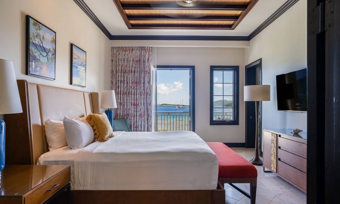 Scrub Island Apartment | Elegant Room with Balcony Ideal for Peaceful Beachside Island Escapes