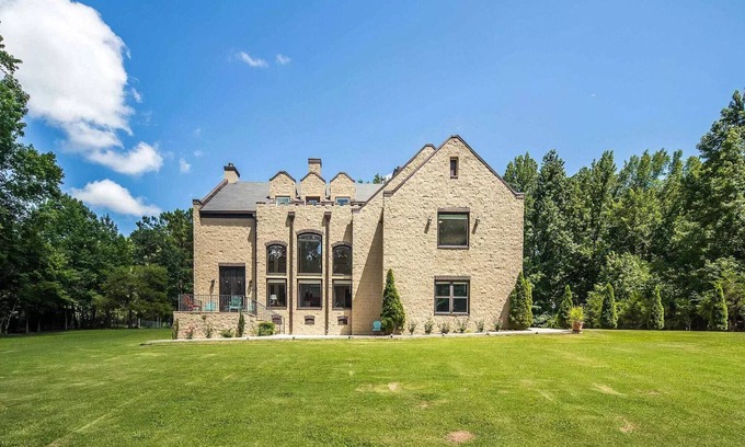 Collierville House | Enchanted Manor: A Luxurious Tudor-Style Retreat Amidst Nature's Splendor