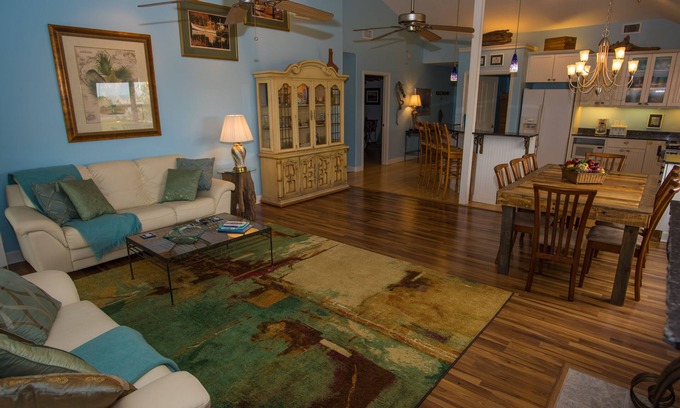 Ocean Springs House | Enchanting Spacious Beach House With Hot Tub, Game Room, Tiki Bar & Fishing Dock