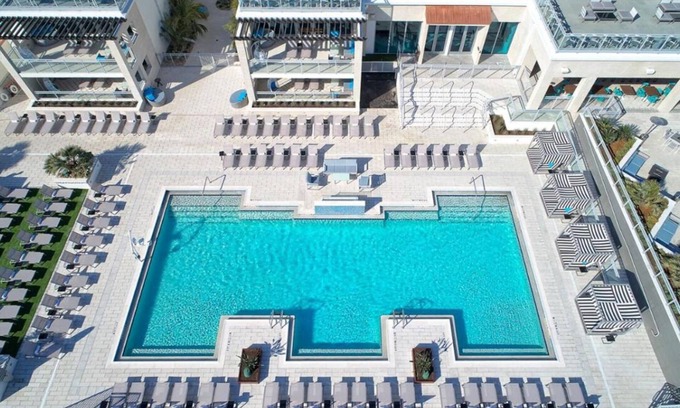 East Daytona Hotel | Enjoy a Hassle-free Stay! Beachfront Property w/Pool, Pets Allowed, Parking!