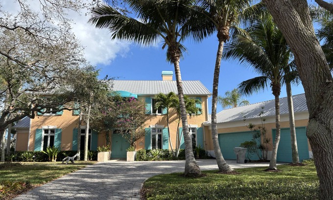 Moorings House | Enjoy our waterfront home with private beach access & boat dock in The Moorings!