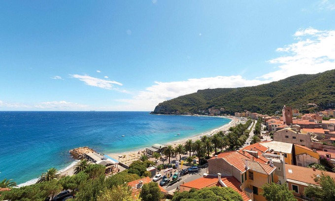 Cogoleto Apartment | Enjoy the view of the blue sea and the nearby beach with your family.